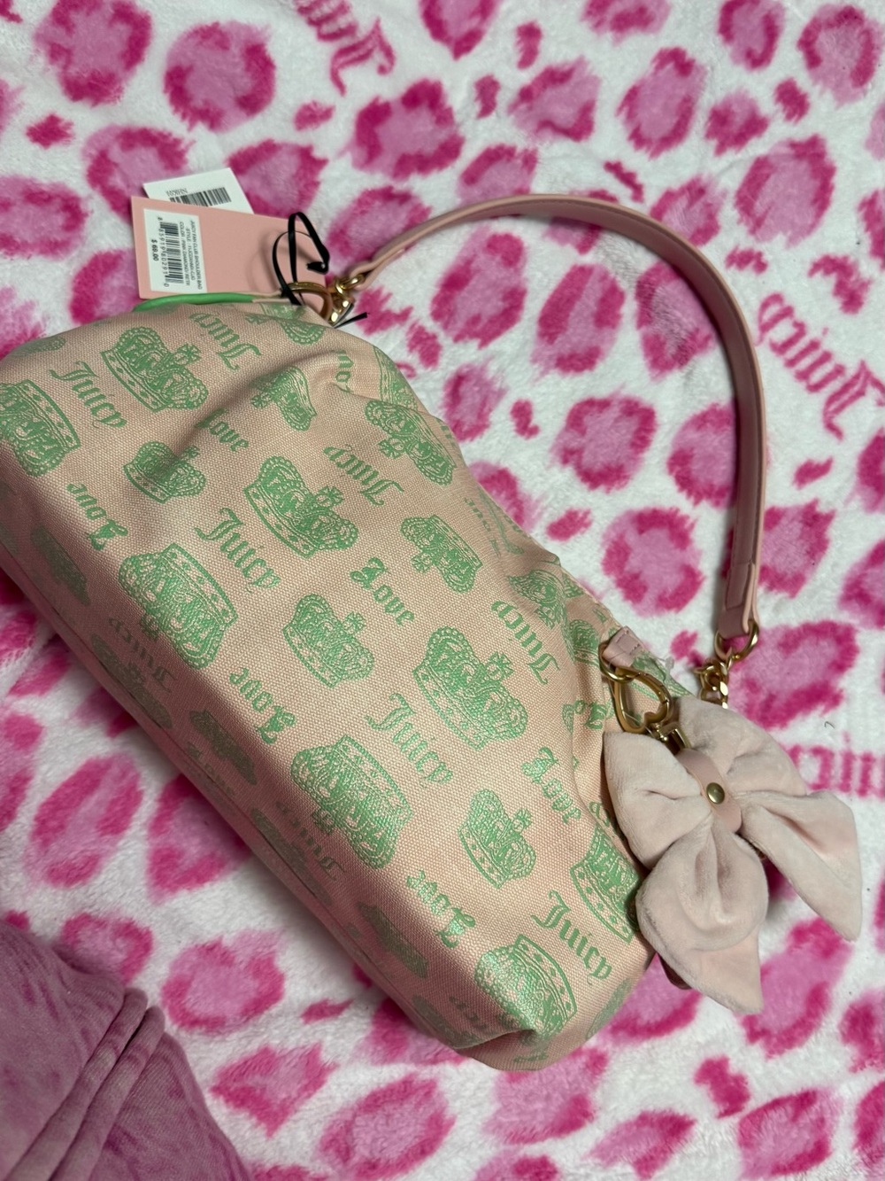 Juicy Couture Pink Canvas Shoulder Bag with Green Logo Print and Bow Accent
